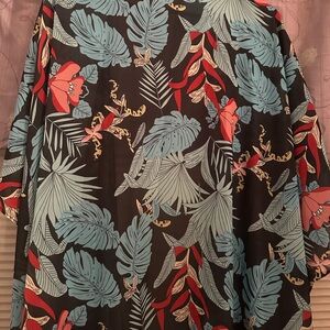 Cute cover for a dress or top. Very colorful floral cover